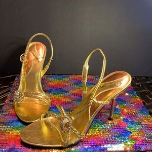 DIVA DNA GOLD HEELS NEW WITH OUT BOX